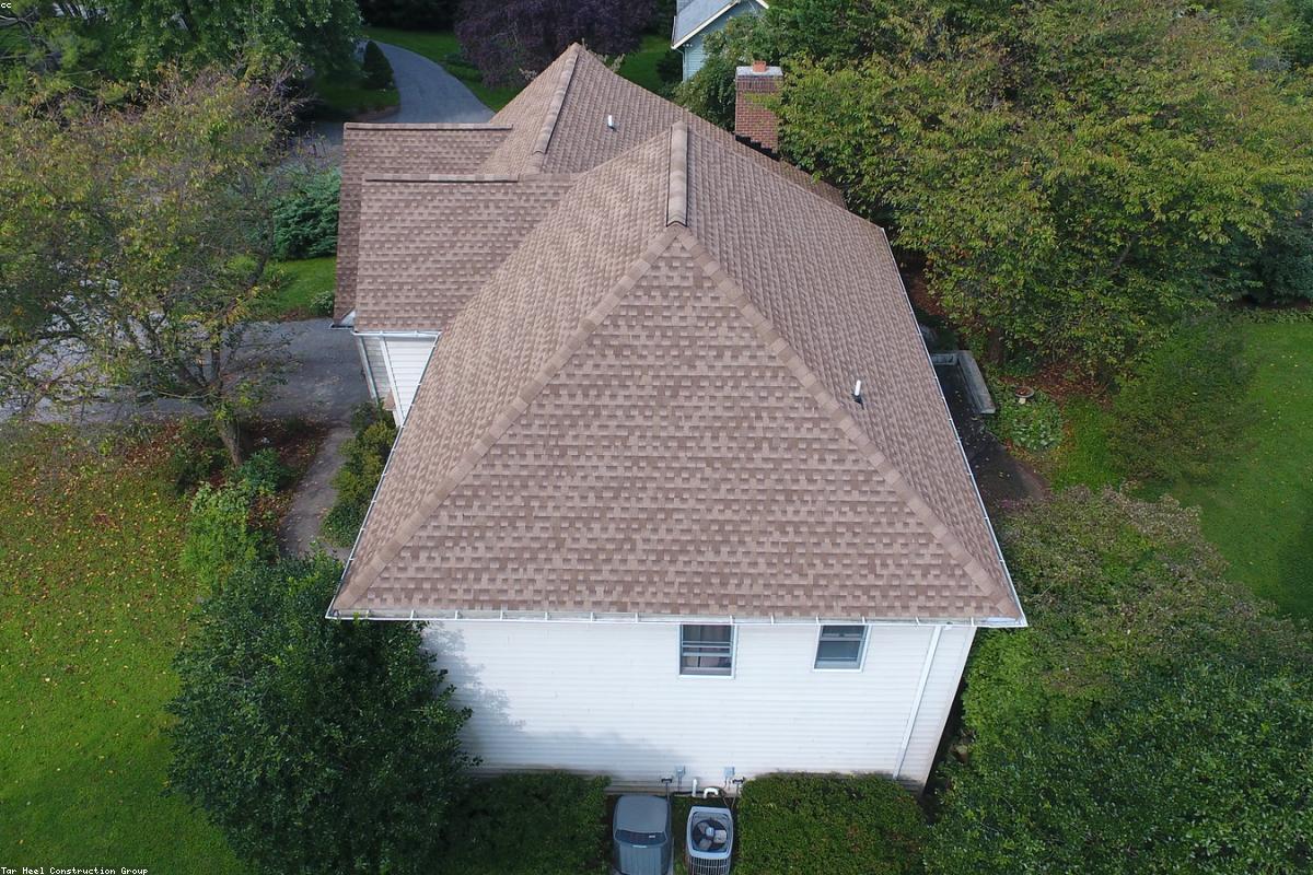 Professional roofing installation on Connecticut home